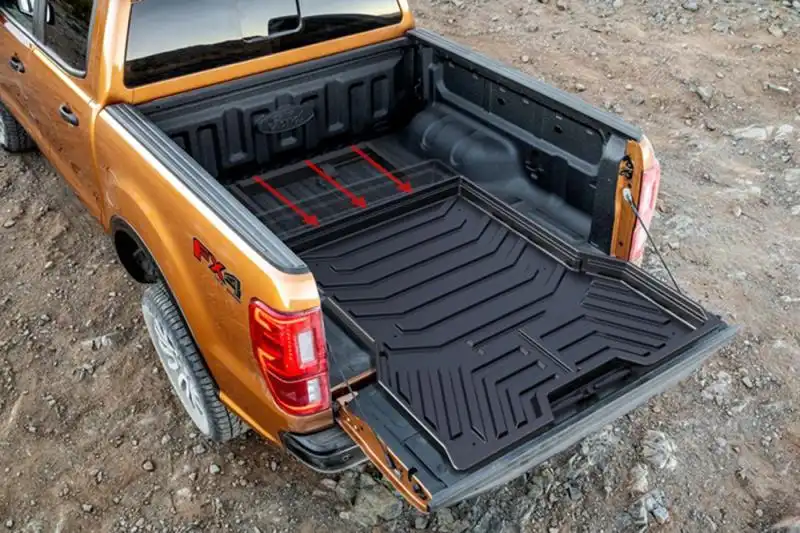 Sliding load tray for pick-up