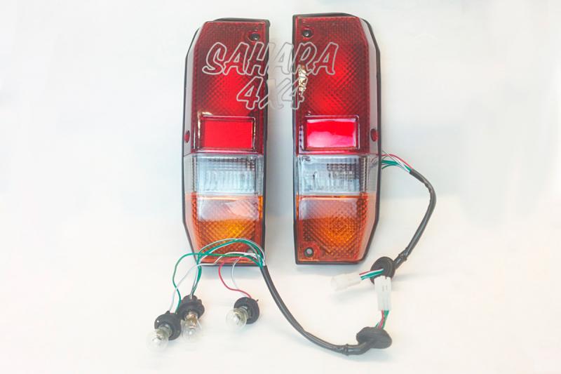 Pair all in one tail light assembly (to supress bumper light)Land Cruiser 70