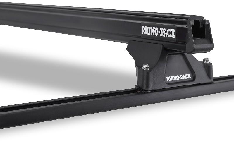 2 Barras de techo Rhino Rack Heavy Duty RLTP Negras  - El sistema Heavy Duty RLT Trackmount se fija a su techo mediante un riel especializado. El diseo de alto perfil es ideal para techos muy curvos. Adems de su resistencia y durabilidad, tiene la ventaja adicional de poder deslizar las barras a lo largo del riel para acomodar cargas de varias longitudes.
