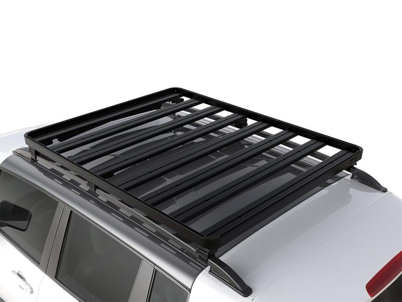 Volvo 900 Series (1990-1998) Slimline II Roof Rail Rack Kit - by Front Runner - This lightweight, modular roof rack is designed specifically for the Volvo 900 Series and features the Slimline II Tray, Wind Deflector, and two pairs of Rail Grip Feet to mount the Slimline II Tray to the roof rails of your Volvo. It is compatible with over 55 accessories so you can customize it to suit your commercial cargo transport needs, lifestyle, and adventures.